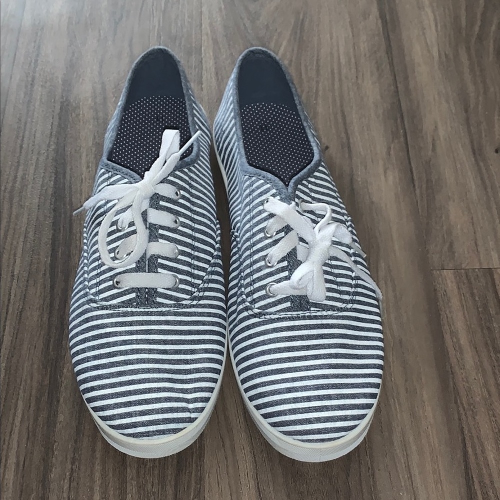 Denim and white slip on shoes with laces